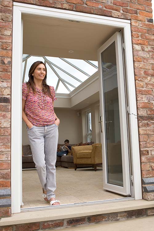 View of orangery inside through french doors