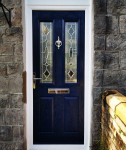 Blue composite door in stone