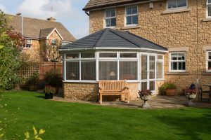 Outside view of a insulated conservatory in the sun