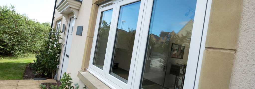 White uPVC window on cream house
